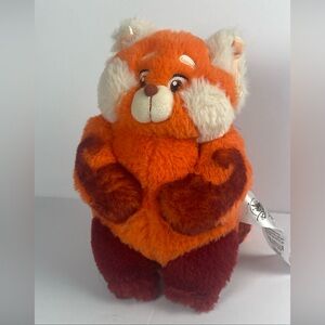 Disney Store Red Panda Mei with purple backpack plush